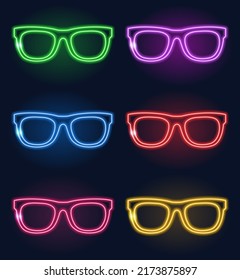 Neon sign. A set of neon glasses in different colors. Laser glowing lines on a black background.