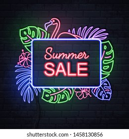 Neon sign summer big sale with fluorescent tropic leaves. Vintage electric signboard.