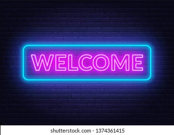 Neon sign welcome on on brick wall background.