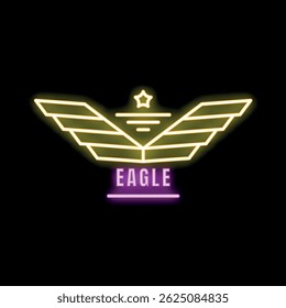 Neon sign of yellow eagle wings with a star on top, glowing on a black background