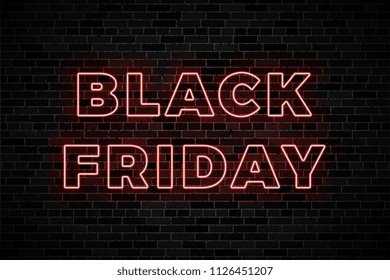 neon signs for black friday sale on dark brick wall background