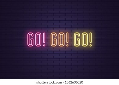 Neon Slogan of call to action GO. Vector illustration, glowing signboard of Motivational neon text GO GO GO. Colorful banner with Inspirational phrase on dark brick wall. Pink, orange and yellow