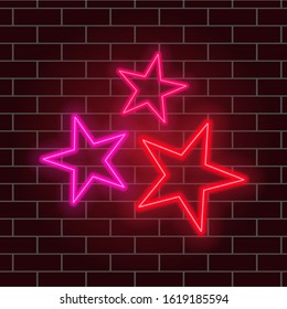 Neon stars. Glowing composition of three five-pointed stars. Night light advertising. Vector illustration