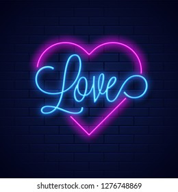 Neon text love and heart shape on blue brick wall background.