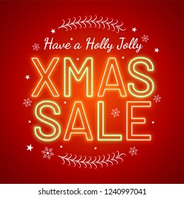 Neon text Xmas Sale on glossy red background for Merry Christmas celebration concept.