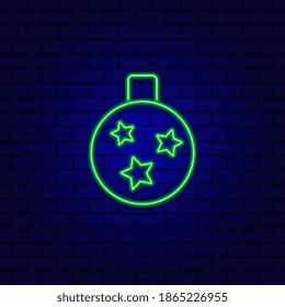 Neon Tree toy. Christmas ball on the wall background.