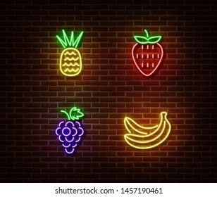 Neon vegetables fruits signs vector isolated on brick wall. Pineapple, strawberry, grape, banana light symbol, decoration effect. Neon nature fruits illustration.