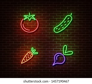 Neon vegetables signs vector isolated on brick wall. Tomato, cucumber, carrot, beetroot light symbol, decoration effect. Neon nature fruits illustration.