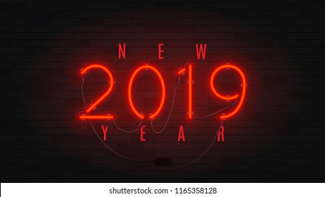 Neon web banner for Happy New Year 2019. Retro neon red billboard on brick wall. Concept of holiday card with glowing text.