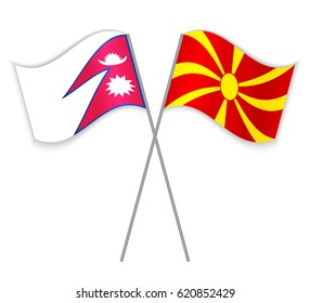 Nepalese and Macedonian crossed flags. Nepal combined with Macedonia isolated on white. Language learning, international business or travel concept.