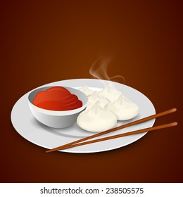 Nepalese traditional dumpling momos with chopstick and sauce on brown background.