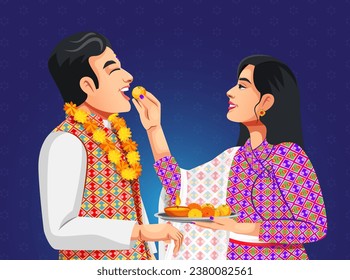 Nepalese women apply a seven colour Tika on forehead and putting laddu in brother's mouth on the occasion of Bhai Tihar or Bhai Tika wearing traditional ethnic clothes