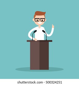 Nerd boy standing behind the tribune and pointing his finger up / flat editable vector illustration