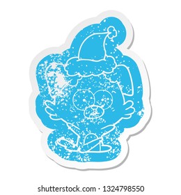 nervous dog quirky cartoon distressed sticker of a wearing santa hat