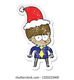 nervous hand drawn distressed sticker cartoon of a boy wearing shirt and tie wearing santa hat