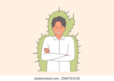 Nervous man experiences aggression and rage due to bad mood, stands in cactus cocoon. Metaphor of toxic business partner demonstrating passive aggression and hating colleagues and subordinates