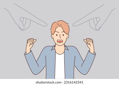 Nervous man waving arms and getting angry standing near pointing fingers symbolizing public opinion. Outraged guy is stressed after learning about public opinion and censure of others