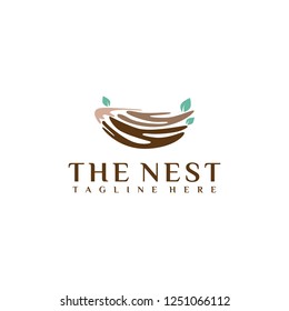 The nest creative logo