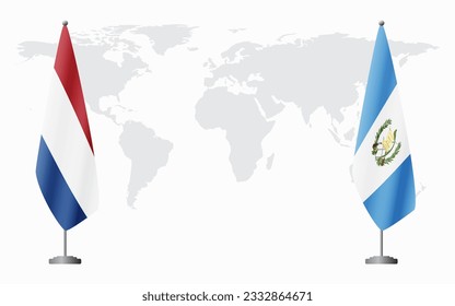 Netherlands and Guatemala flags for official meeting against background of world map.