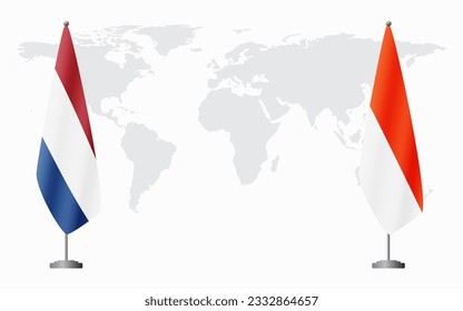 Netherlands and Indonesia flags for official meeting against background of world map.