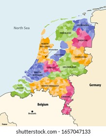 Netherlands local municipalities colored by provinces map with neighbouring countries and terrotories. Vector