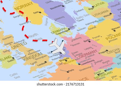 Netherlands with plane and dashed line on europe map, close up Netherlands, vacation and road trip concept, pinned destination, travel idea, colorful map with location icon, top view