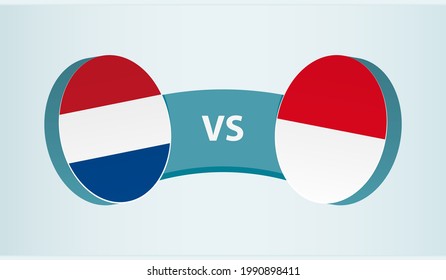 Netherlands versus Indonesia, team sports competition concept. Round flag of countries.