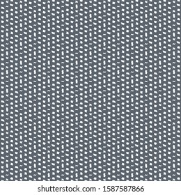 A network of thick threads with uneven meshes. Retro textile pattern. Dark gray background with small white spots.