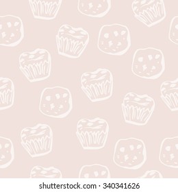 Neutral seamless pattern with cookies and muffins drawn in doodle style. Nice background in delicate beige and pink colors for your design.