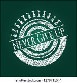 Never Give Up chalkboard emblem written on a blackboard