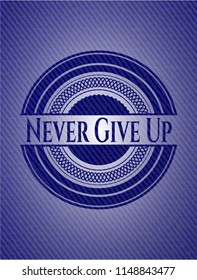 Never Give Up emblem with jean background