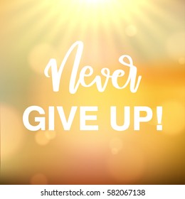 never give up lettering , an inspirational quote with modern calligraphy on sun ray and bright bokeh background for motivation card or poster in vector illustration EPS10