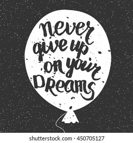 Never give up on your dreams quote. Handmade vector calligraphy.