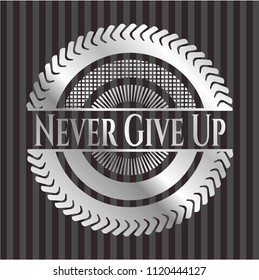 Never Give Up silver emblem or badge