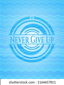 Never Give Up sky blue water wave style badge.