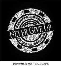   Never Give Up written with chalkboard texture