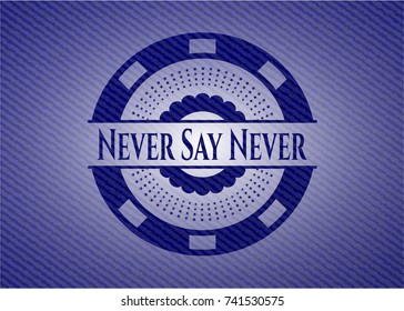 Never Say Never badge with denim background