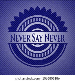Never Say Never emblem with jean background