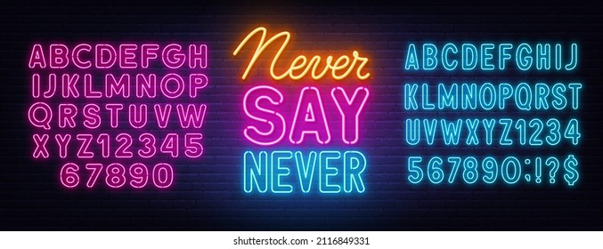 Never Say Never neon quote on a brick wall.