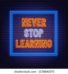 Never stop learning. Neon sign on a dark background.