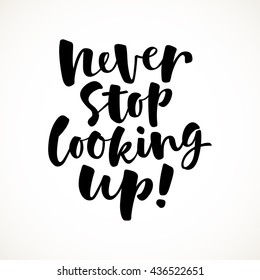 Never stop looking up vector lettering card. Hand drawn illustration phrase. Handwritten modern brush calligraphy for invitation and greeting card, t-shirt, prints and posters