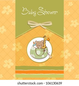 new baby announcement card with bag and same toys