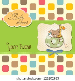 new baby announcement card with bag and same toys