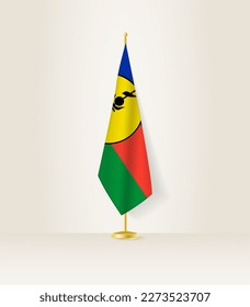 New Caledonia flag on a flag stand. Vector illustration.