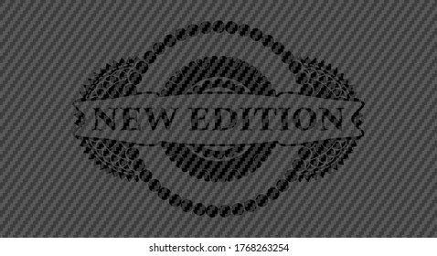 New edition text inside carbon fiber dark emblem. Polymer texture handsome background. Vector illustration. 