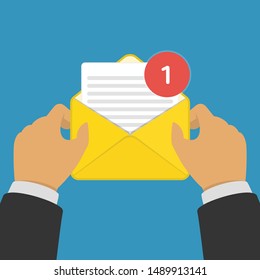 New Email or SMS message incoming. Hand holding envelope, letter. Mail notification or coming messages concept. Vector illustration in modern flat style. EPS 10.