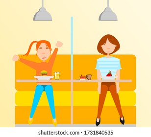 New normal Covid-19 social distancing and food court table.People having foods with suitable seating arrangements in Canteen, keep distance away by use mirror partition on table.To protection.
