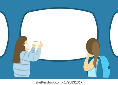 New normal travellers travel by the train and one of them is taking photo by smartphone. Wearing mask during going outside. Copy space. New normal in this Covid pandemic period.