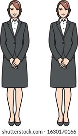 A new office worker is standing up and talking to someone.