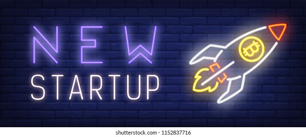 New startup neon text with rocket and bitcoin sign. Business and technology concept. Advertisement design. Night bright neon sign, colorful billboard, light banner. Vector illustration in neon style.